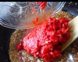 A picture of step 4 of Sweet & Spicy Red Chilli Chundo | Jaggery Preserve.