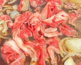 A picture of step 3 of Sukiyaki Udon: Udon Noodles in Sweet & Savory Broth.