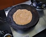 A picture of step 2 of Banana pancake with nutella.