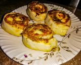 A picture of step 9 of Pizza Pinwheels.