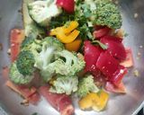 A picture of step 4 of Tomato Soup with sauteed garlic vegetables.