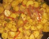 A picture of step 6 of Curried potatoes.