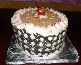 A picture of step 9 of Polka Dot Chocolate Icing cake.