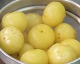 A picture of step 1 of Khati mithi amla candy.