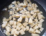 A picture of step 3 of Gobhi nu shak.