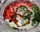 Une image de l'étape 8 de Salade marinée de concombre et tomates à la coriandre.