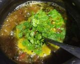 A picture of step 11 of Drum stick leaves Rasam.