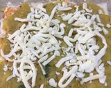 A picture of step 11 of Bread pinwheels with cheese.