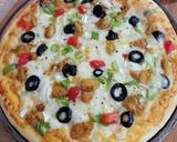 A picture of step 4 of Chicken Tikka Pizza 🍕🍕.