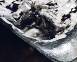 A picture of step 3 of Hot Fudge Ice Cream Cake.