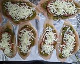A picture of step 5 of Chicken pesto rolls up.