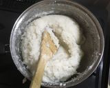 A picture of step 3 of Ugali served with cabbage and beef wet fry.