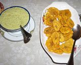 A picture of step 2 of Tostones (Patacones) with Green Garlic Sauce.