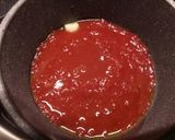 A picture of step 1 of Sea bass with tomato and olive sauce.