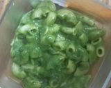A picture of step 4 of Green and pink sauce backed pasta.
