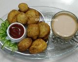 A picture of step 5 of Egg Fritters with Tea.