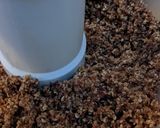 A picture of step 2 of Energy balls (tahini, oat + orange).