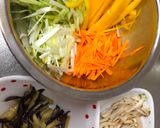 A picture of step 3 of Japanese colorful vegetables salad with sesame dressing.