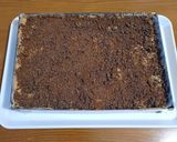 Foto del passaggio 12 della ricetta Dolce al caffè e mascarpone con cioccolato