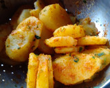 Foto del paso 3 de la receta: Papas al horno con ajo, perejil y queso parmesano