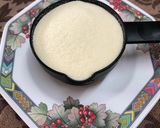 A picture of step 1 of Eggless Semolina Cake.