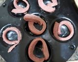 A picture of step 2 of Egg sausage Cups.