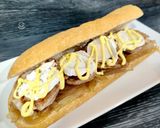 Foto del paso 4 de la receta: Bocadillo de solomillo y queso de cabra con cebolla caramelizada y salsa miel-mostaza