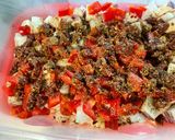 Une image de l'étape 10 de Aubergine et poivron aux tomates confites, coriandre et épices.