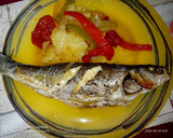 Foto del paso 7 de la receta: Lubina al horno con guarnición🐟🐟🐟🍅🍅🥔🥔🧅🧅