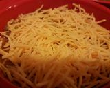A picture of step 2 of Chili cheese dip.