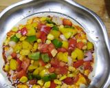 A picture of step 8 of Cheese burst pizza kadai baked.
