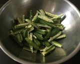 A picture of step 1 of Bhindi Kurkuri.