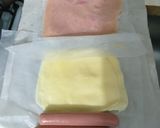 Foto del paso 2 de la receta: Salchichas jamón y queso apanadas con pan rallado