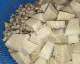 A picture of step 1 of Yam &beans porridge.
