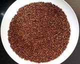 A picture of step 1 of Whole Moong Laddu.