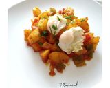 Foto del paso 7 de la receta: Patatas con tomate y huevos de codorniz