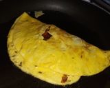 A picture of step 5 of Inda na puda (stuff egg omelette).