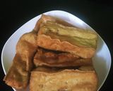 Hình bước làm 3 của món Ốc nhồi om cà tím