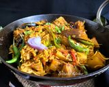 A picture of step 12 of Echorer Muri Ghonto (Green Jackfruit Cooked with Basmati Rice - Bong Style).