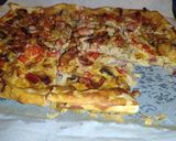 Foto del paso 13 de la receta: Empanada de hojaldre con bacon, cebolla, pimiento rojo, champiñones y nata para cocinar