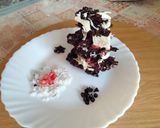 A picture of step 5 of Pomegranate and coconut flakes Dark chocolate bark.