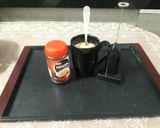 A picture of step 5 of Cardamom coffee.