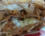 صورة لخطوة 4 من وصفة طاكوس تارتيني 🫔🌮