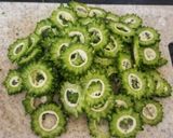 A picture of step 1 of Crispy Karela Chips.