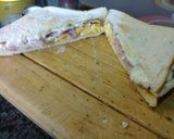 A picture of step 8 of Bacon and egg deluxe sandwich.