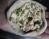 A picture of step 6 of Stuffed paneer paratha with tomato onion chutney.