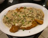 A picture of step 4 of Pork Medallions in a Mushroom Cream Sauce.