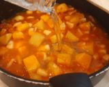 Foto del paso 5 de la receta: Merluza guisada en salsa de langostinos