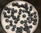 A picture of step 4 of Ricotta and Yogurt Cake with Chocolate and Blueberries.