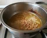Foto del paso 5 de la receta: Guiso de cerdo con garbanzos a la naranja